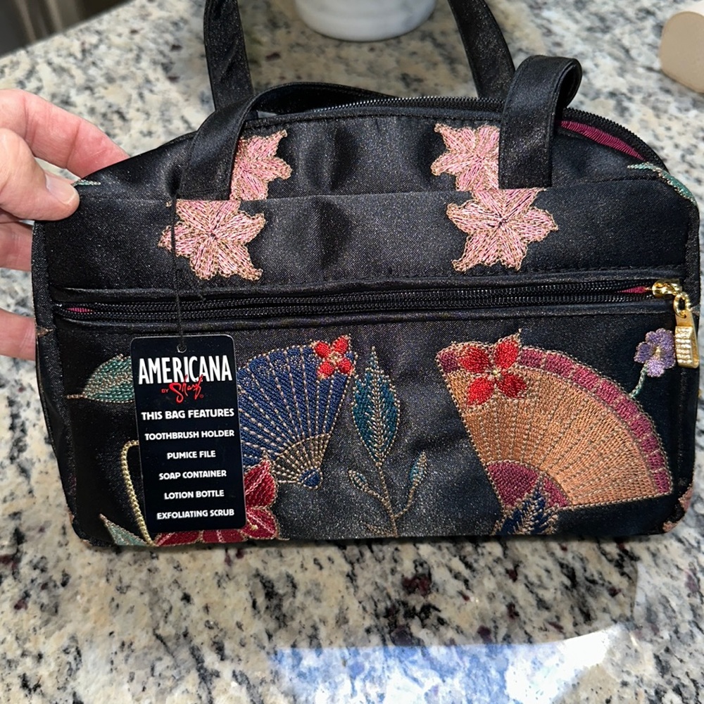 Women’s cosmetic/travel bag, brand new